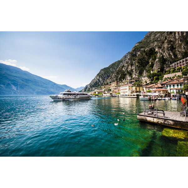 Breakwater Bay Ferry Boat Departing From Limone Del Garda, Italy